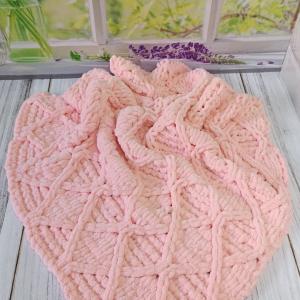 Patterned baby blanket made with knitted and plush (puffy) yarn