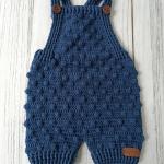 Hand-knitted baby romper and hat set. Embossed and bud-patterned.