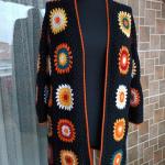 Handmade Crochet Women's Cardigan with Colorful Motifs & Black Accents – Lightweight, Cozy, Stylish Layer for Casual or Statement Looks